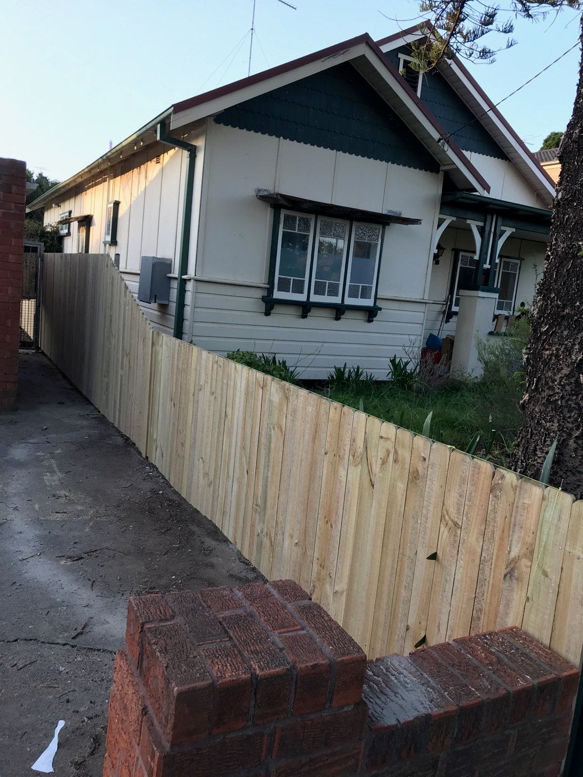 Single paling treated pine timber fence installed along a side access path in Blacktown, Sydney