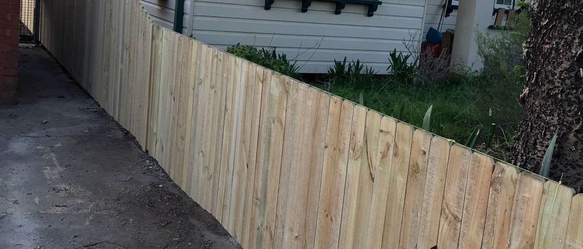 Single paling treated pine timber fence installed along a side access path in Blacktown, Sydney